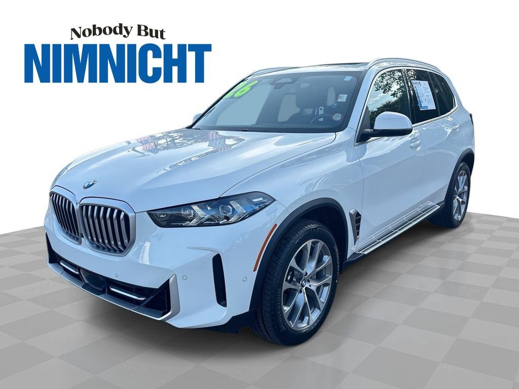 Used 2026 Black BMW sDrive40i image 1