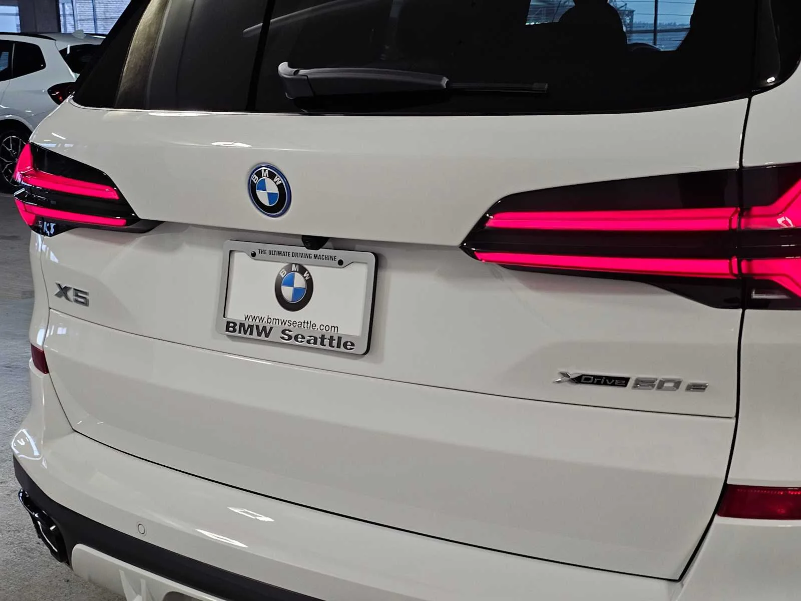 New 2026 Alpine White BMW xDrive50e image 7