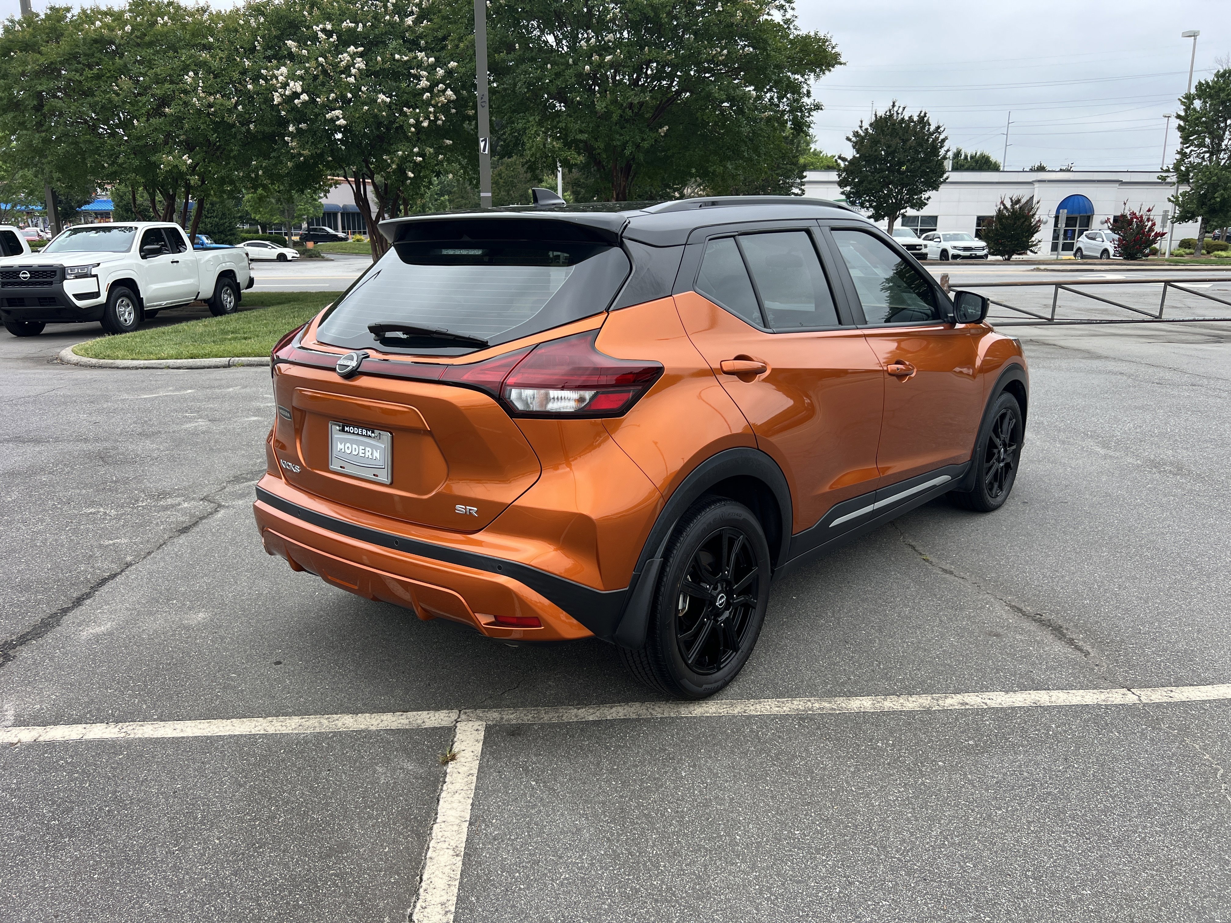 Certified Used 2023 Monarch Orange Metallic/Super Black Nissan SR image 5