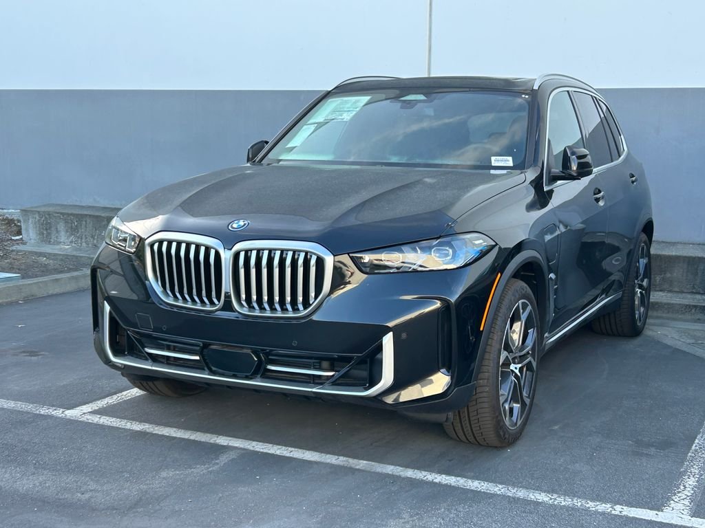 New 2026 Black Sapphire Metallic BMW xDrive50e image 2
