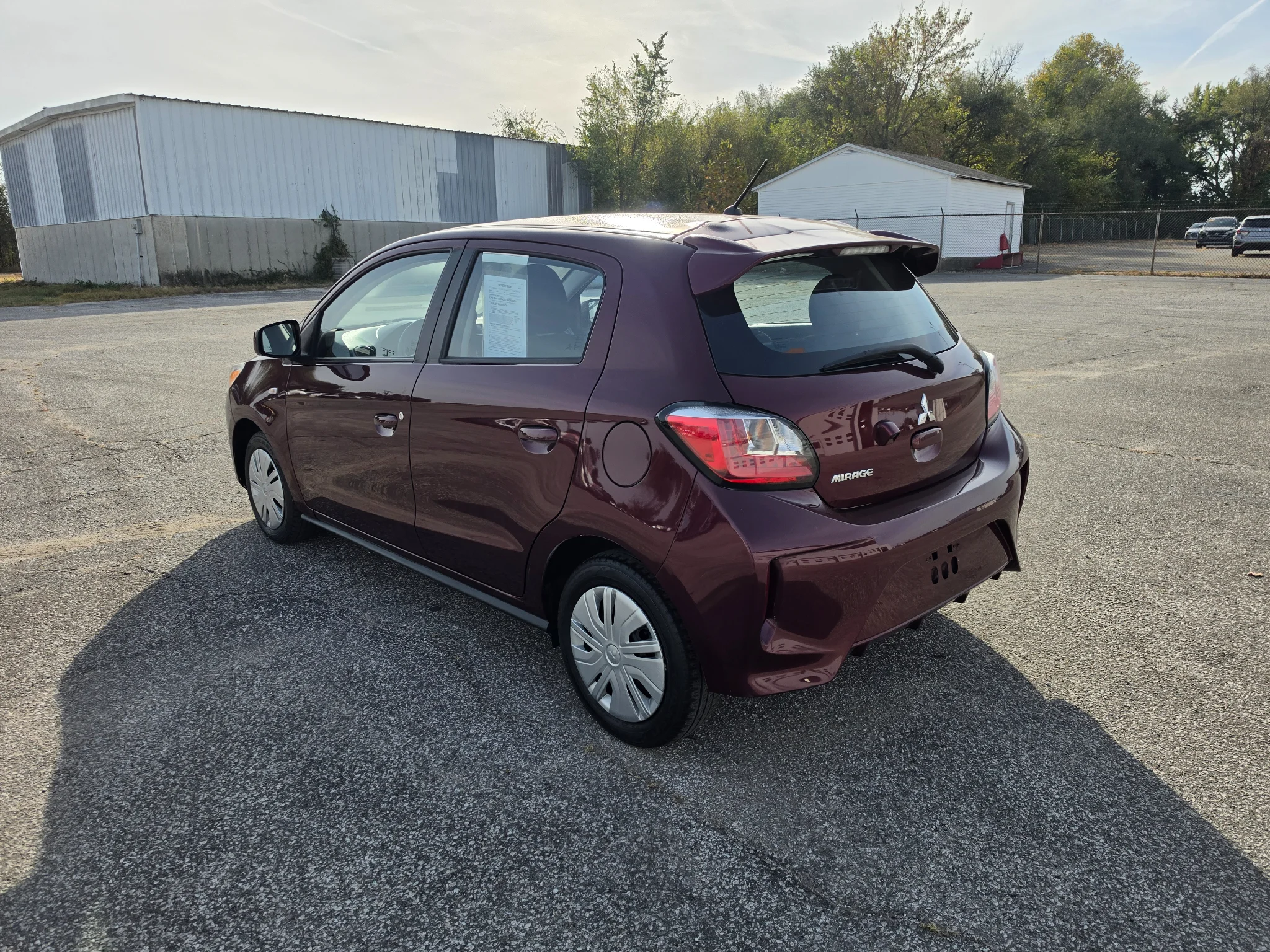 Used 2024 Wine Red Metallic Mitsubishi ES image 4