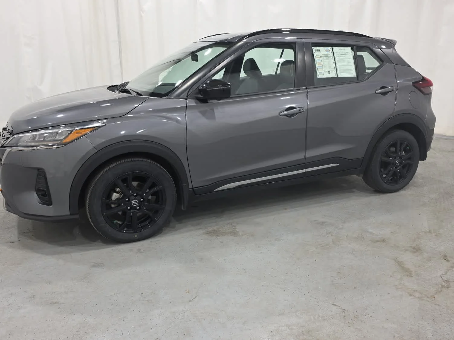 Used 2023 Gun Metallic Nissan SR image 2