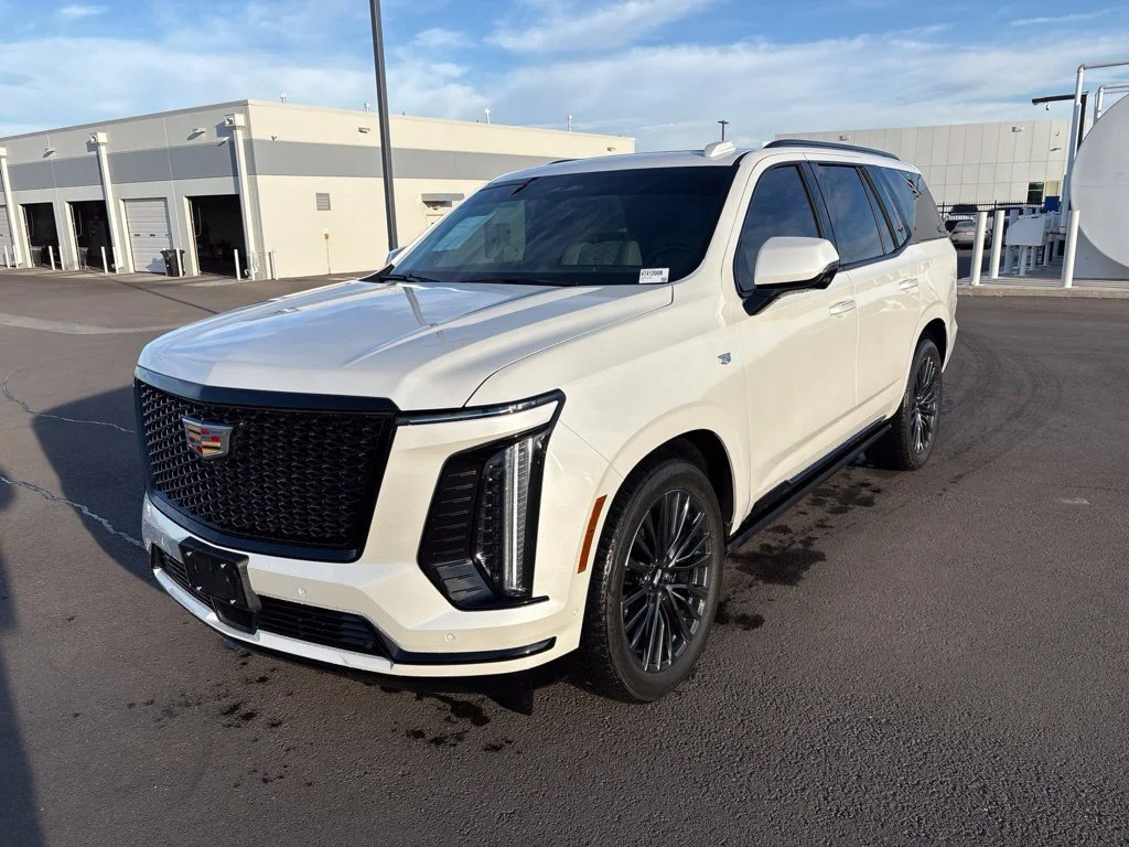 Used 2025 Crystal White Tricoat Cadillac Sport Platinum image 1