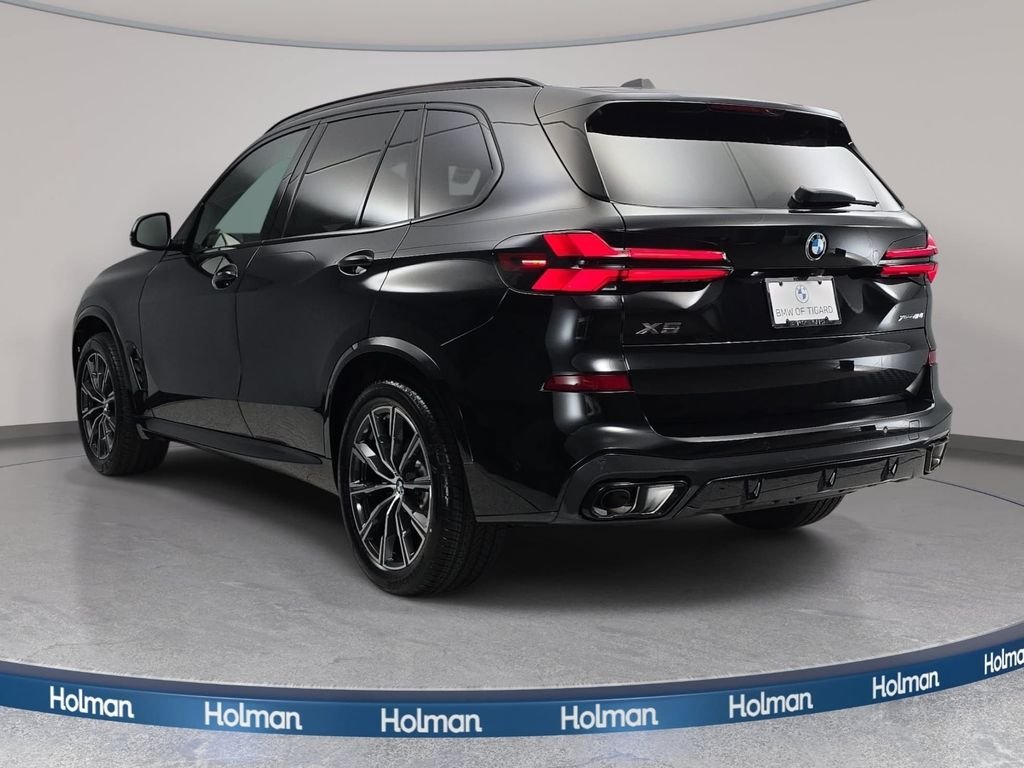 New 2026 Black Sapphire Metallic BMW xDrive40i image 7