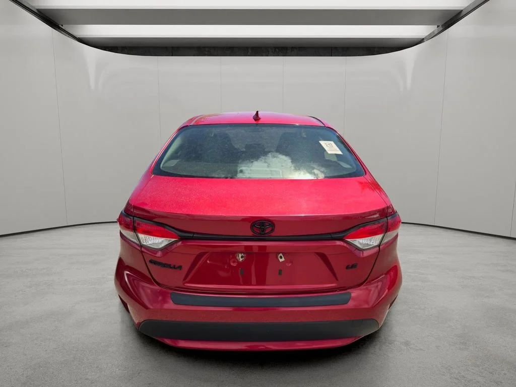 Used 2021 Barcelona Red Metallic Toyota LE image 8