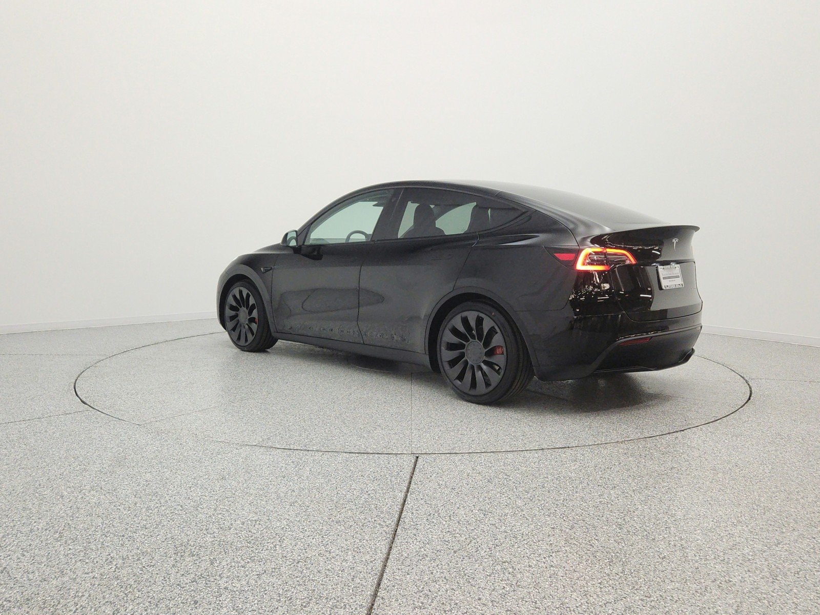 Used 2022 Solid Black Tesla Performance AWD image 7