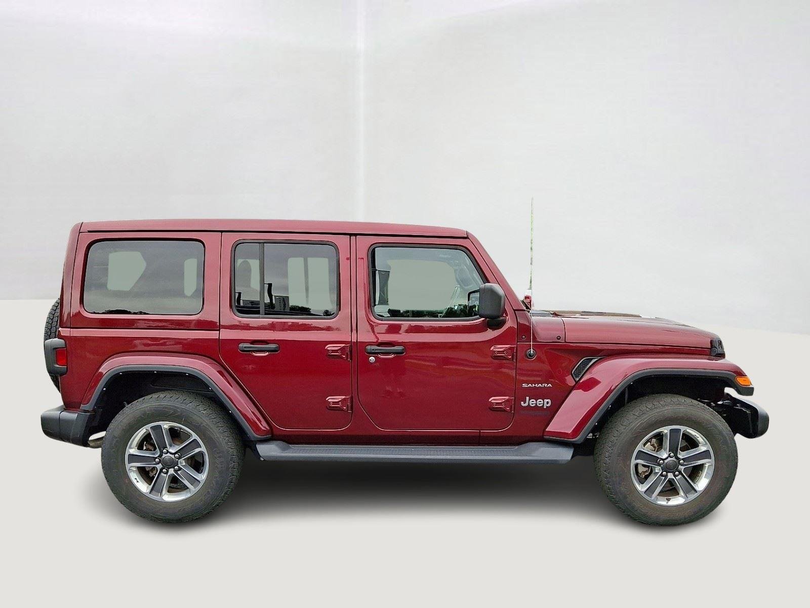 Used 2021 Snazzberry Pearlcoat Jeep Unlimited Sahara image 8