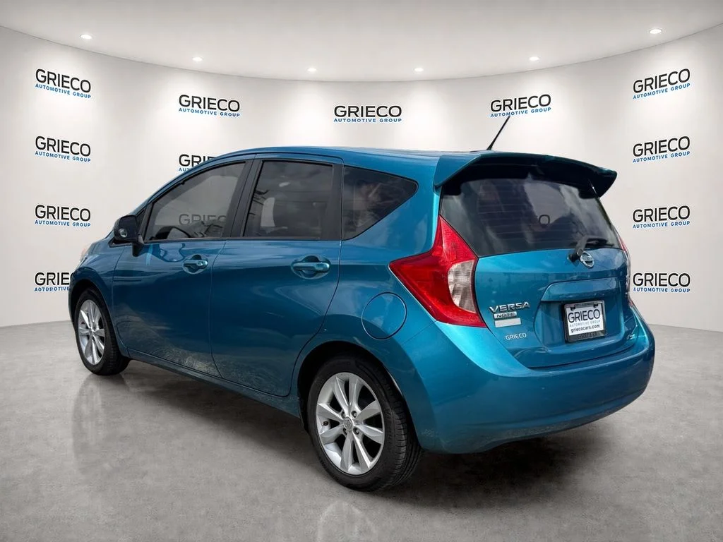 Used 2014 Metallic Peacock Nissan SV image 5