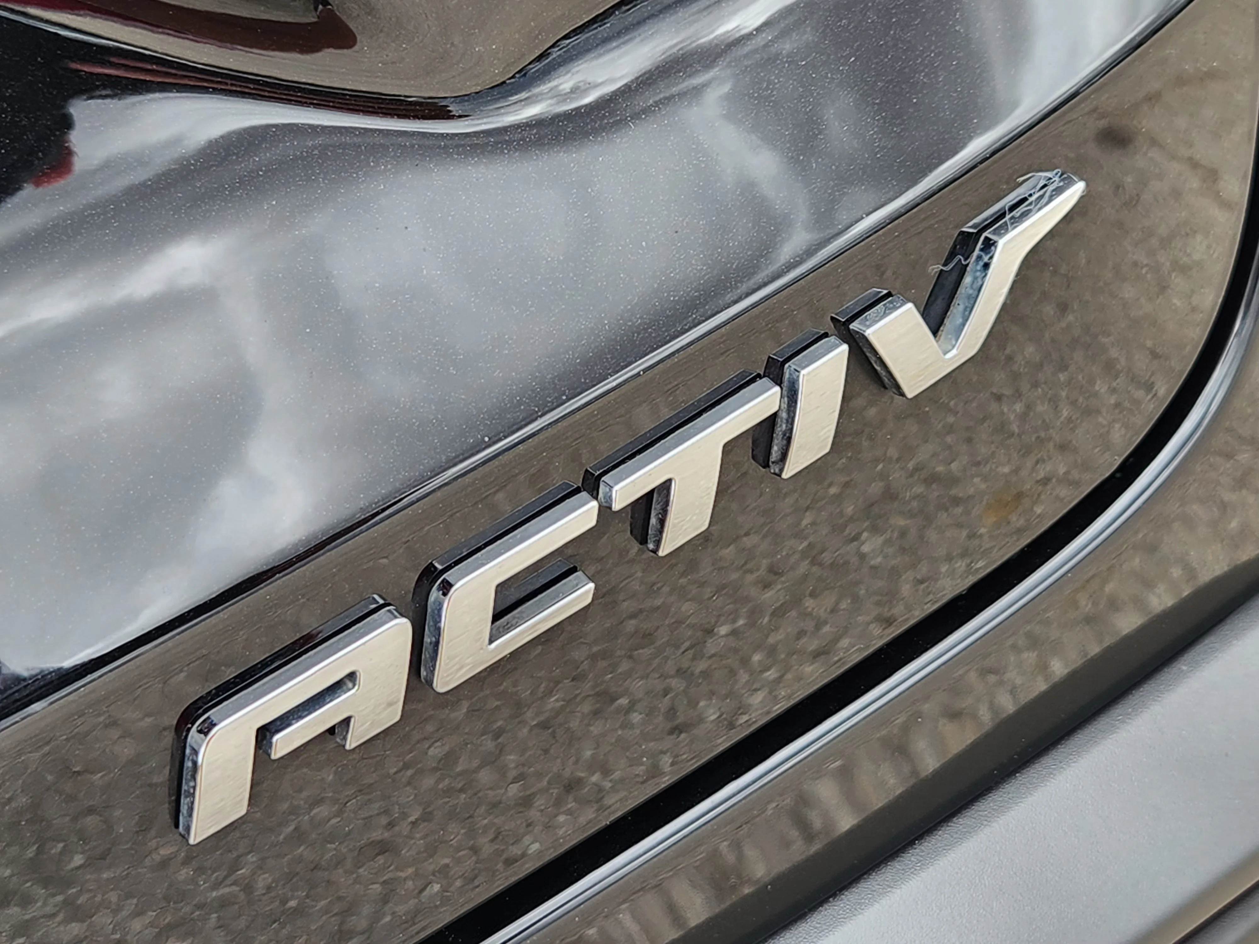 Used 2024 Mosaic Black Metallic Chevrolet ACTIV image 13