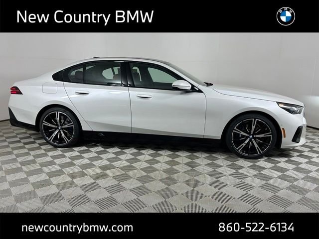 New 2026 Mineral White Metallic BMW 550e xDrive image 8