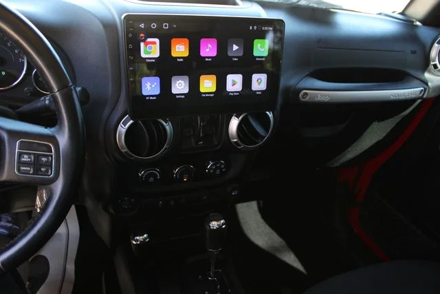 Used 2018 Red Jeep Unlimited Sahara image 11