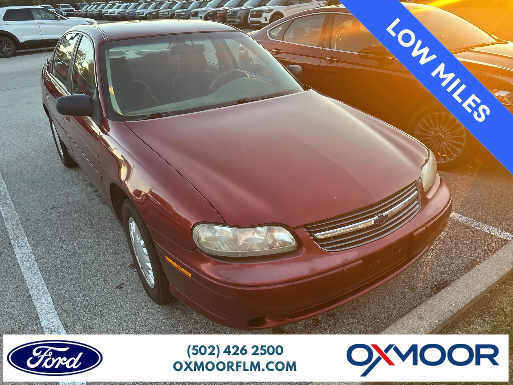 Used 2002 Redfire Metallic Chevrolet Base image 1