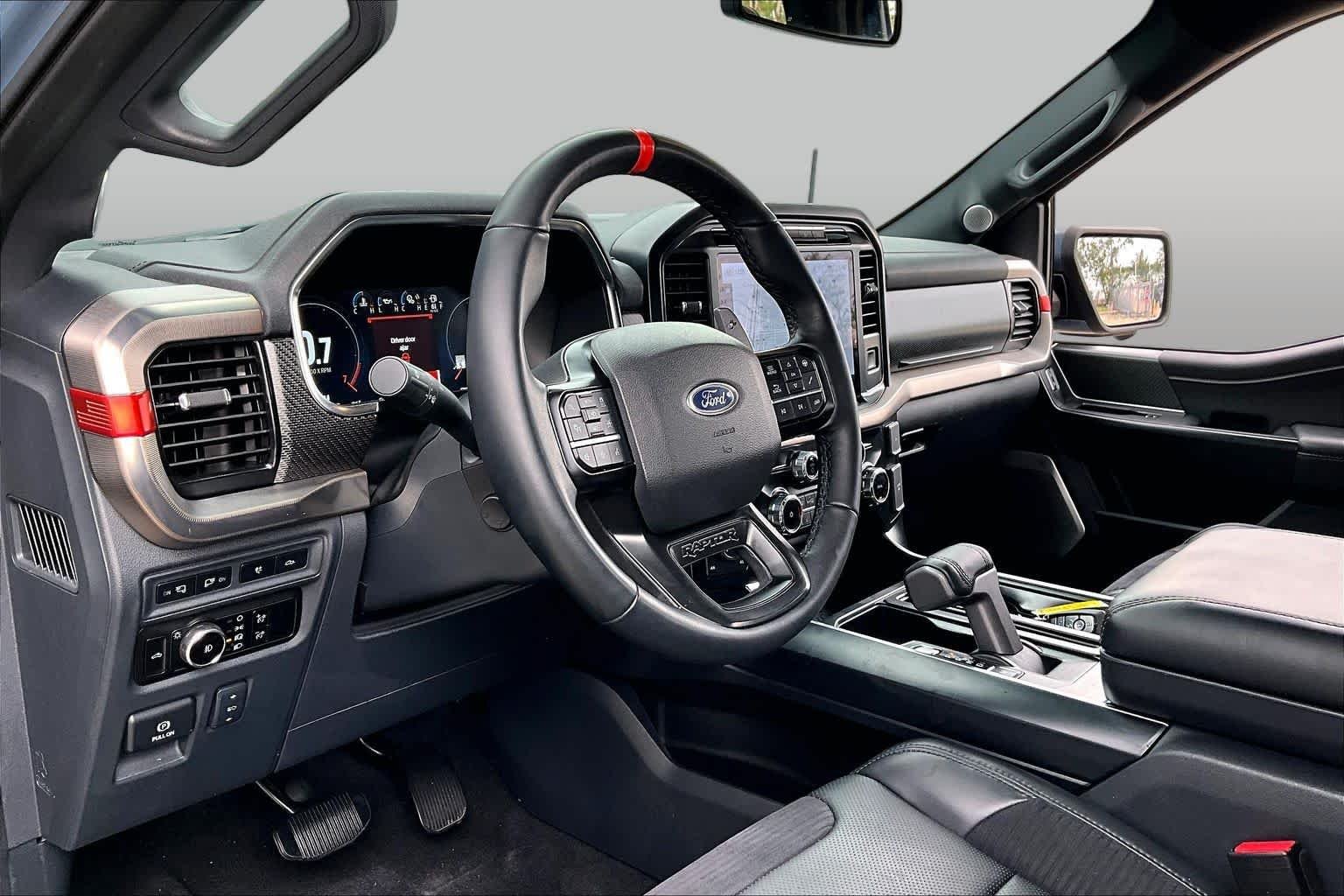 Used 2023 Azure Gray Metallic Tri-Coat Ford Raptor image 18