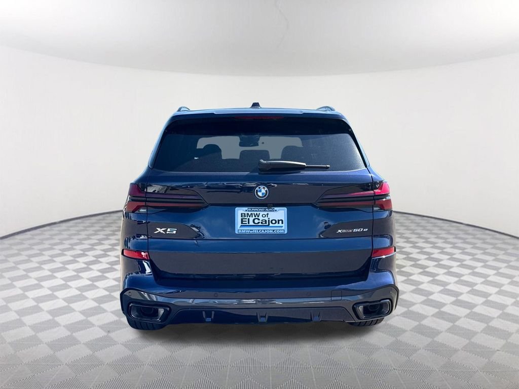 New 2026 Tanzanite Blue II Metallic BMW xDrive50e image 5