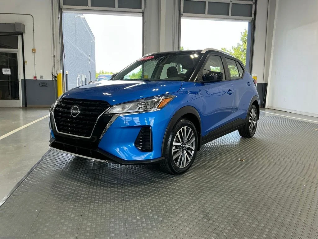 Used 2023 Electric Blue Metallic/Super Black Nissan SV image 2