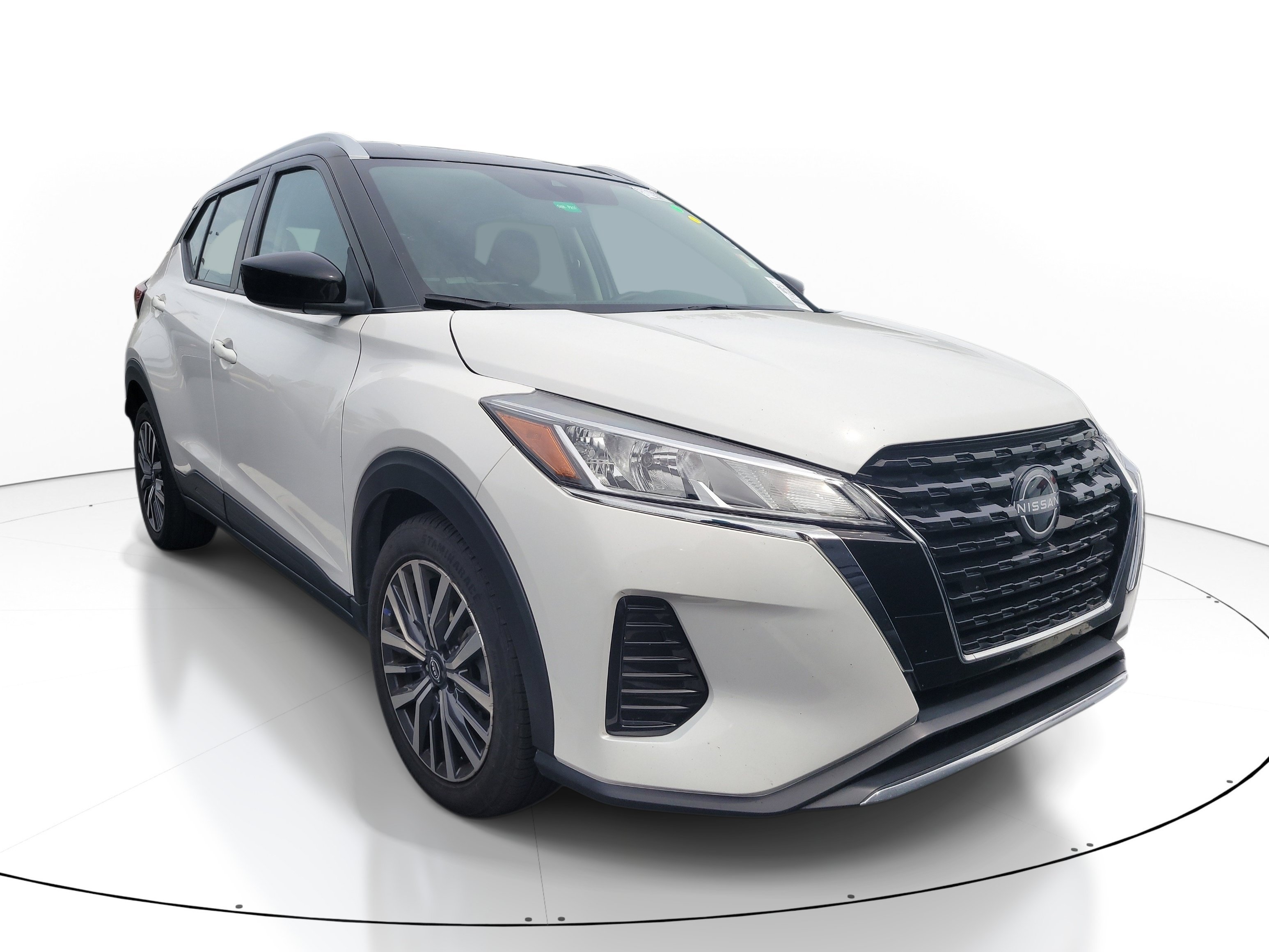 Used 2023 Aspen White Tricoat/Super Black Nissan SV image 1