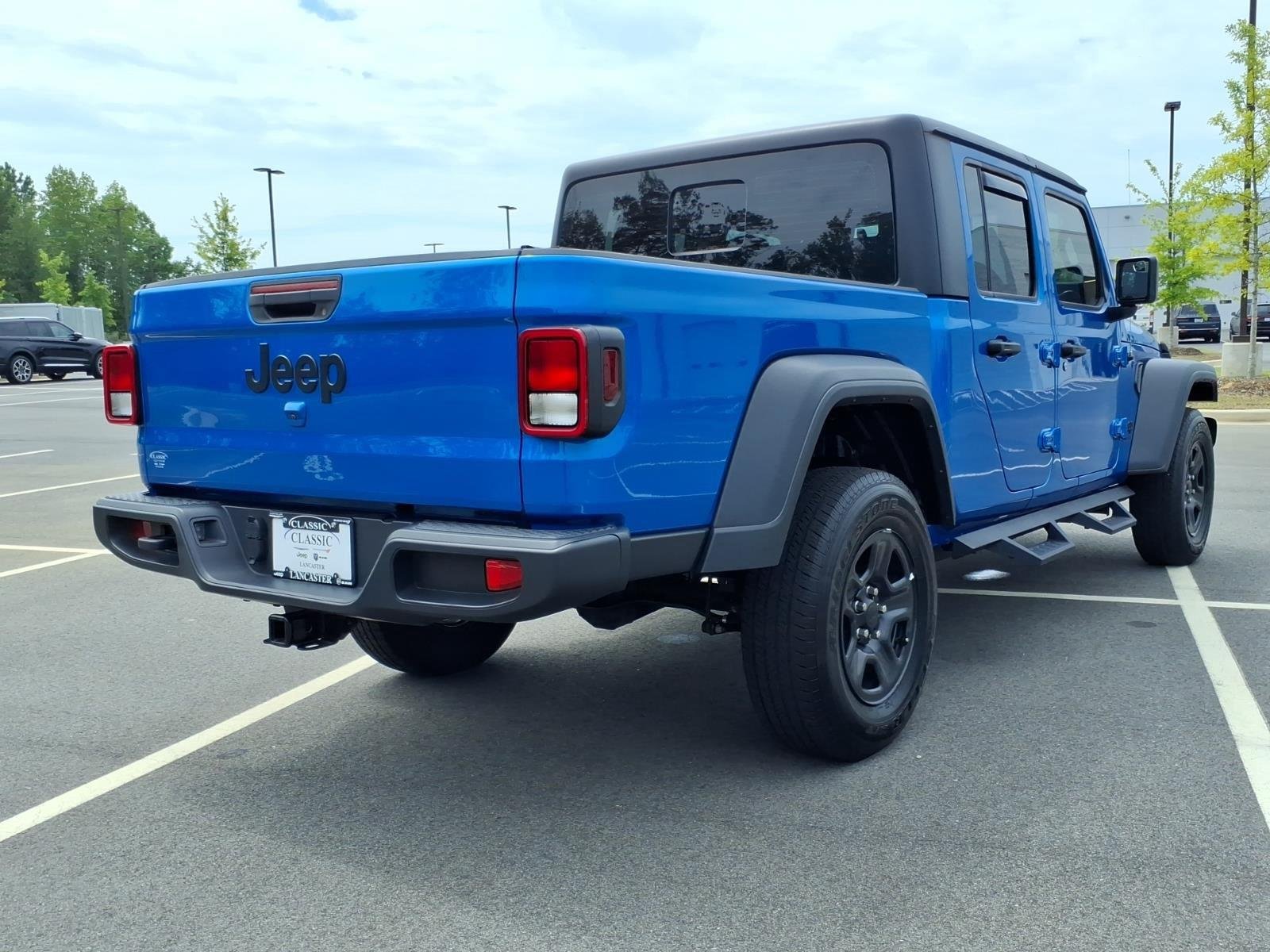 Used 2023 Hydro Blue Pearlcoat Jeep Sport image 2