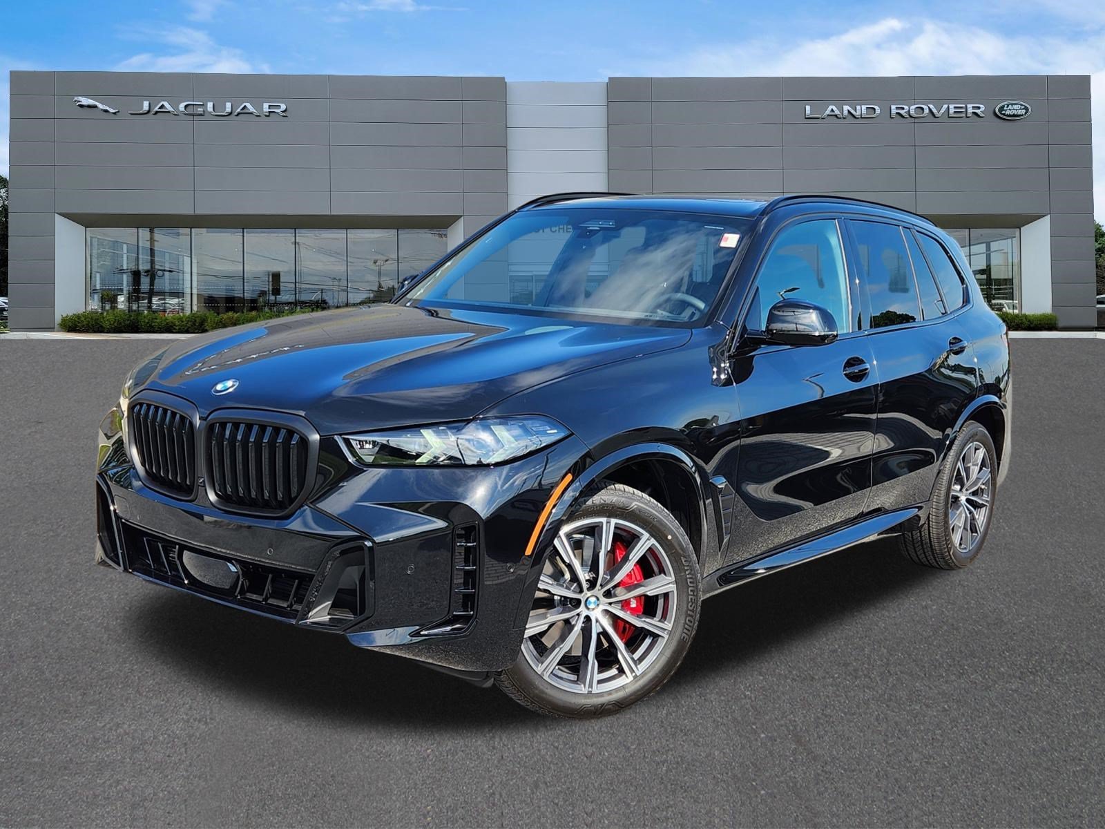 Used 2026 Black Sapphire Metallic BMW xDrive40i image 1