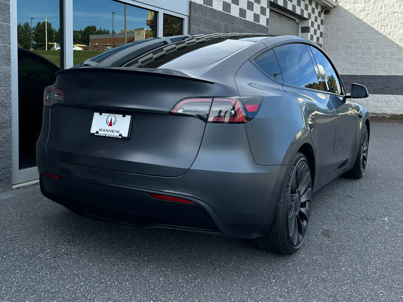 Used 2022 Solid Black Tesla Performance image 4