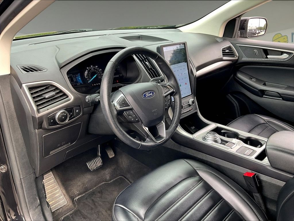 Used 2024 Agate Black Metallic Ford SEL image 8