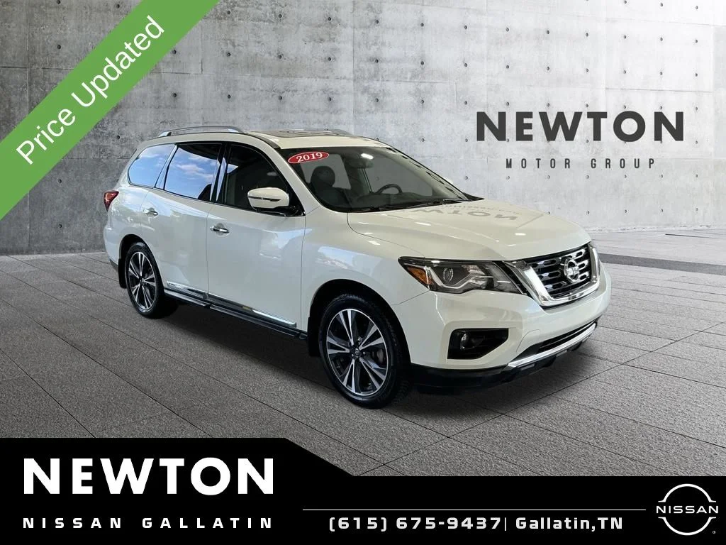 Used 2019 Pearl White Nissan Platinum image 1