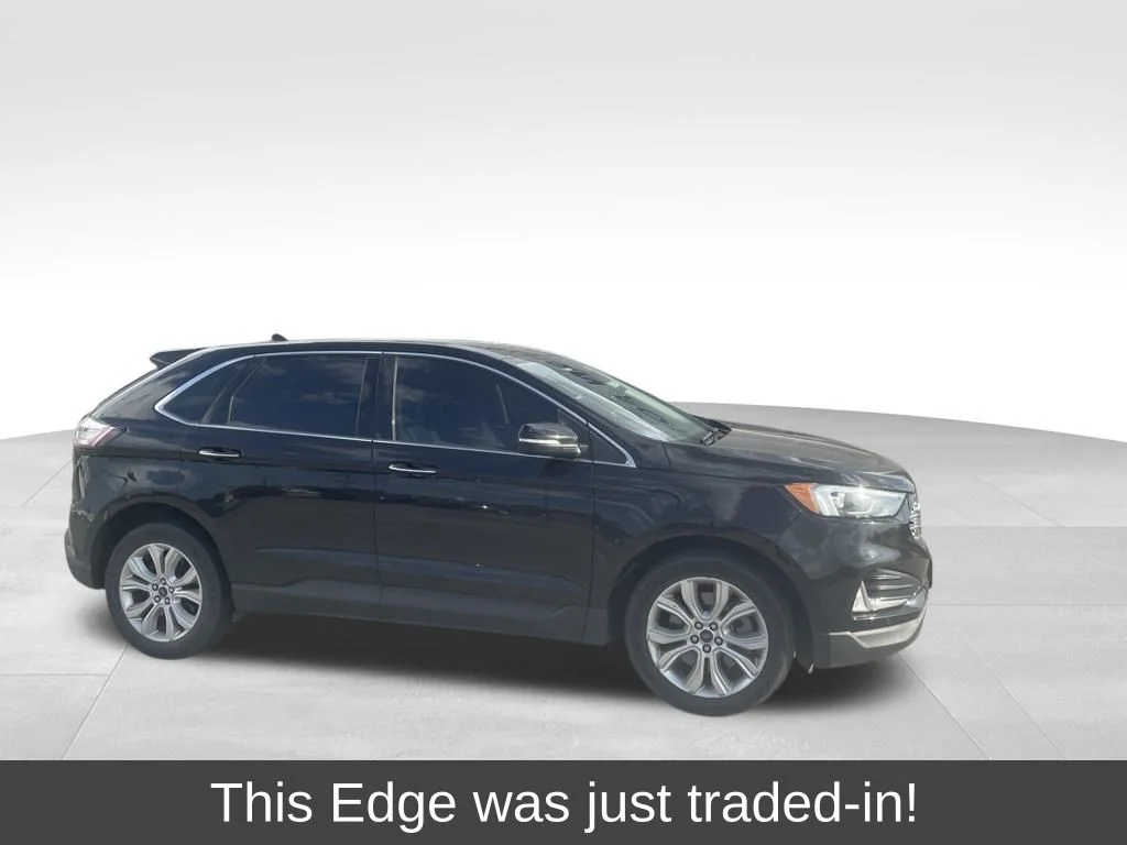 Used 2022 Black Ford Titanium image 1