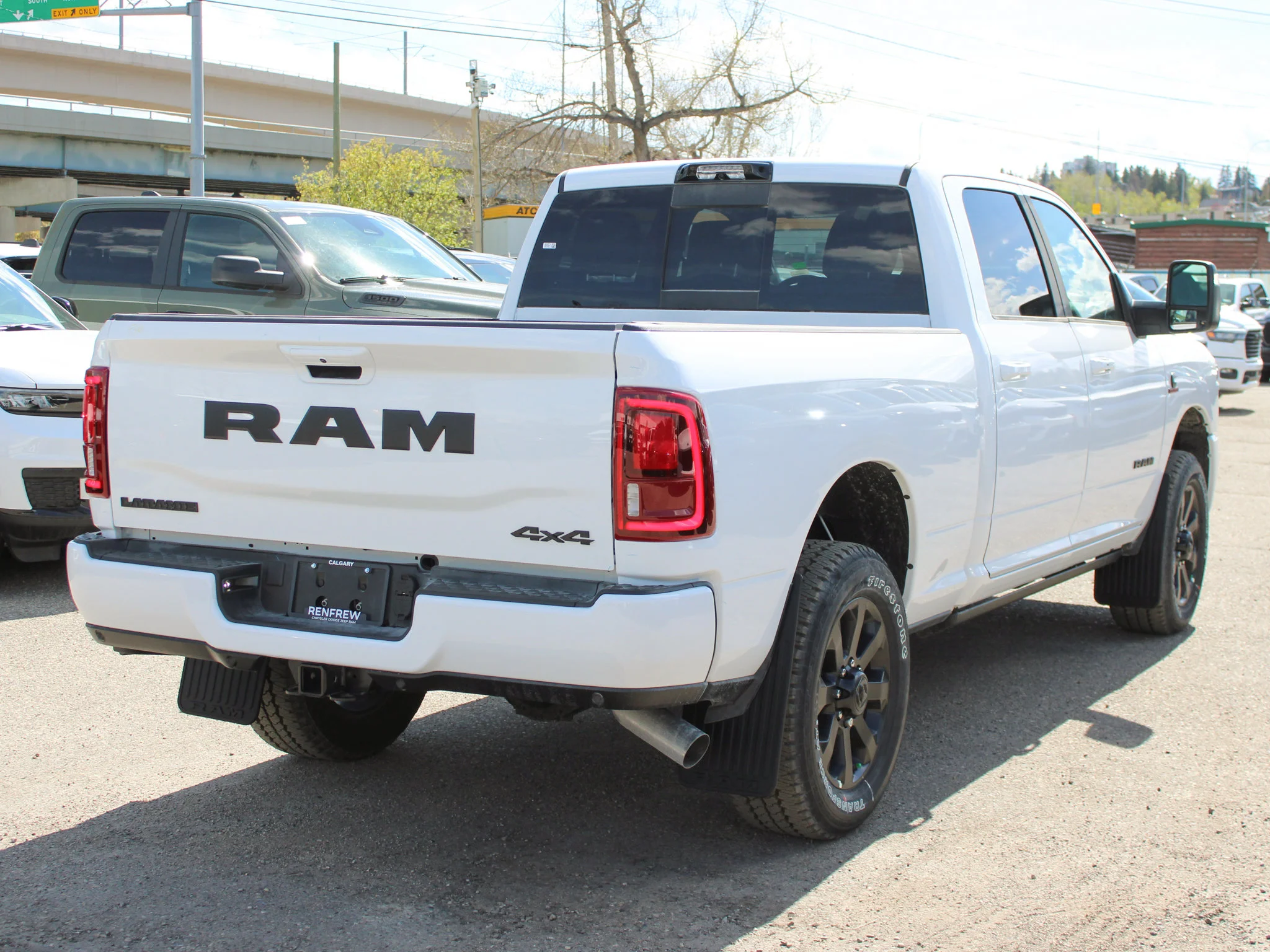 New 2026 White RAM Laramie* image 5