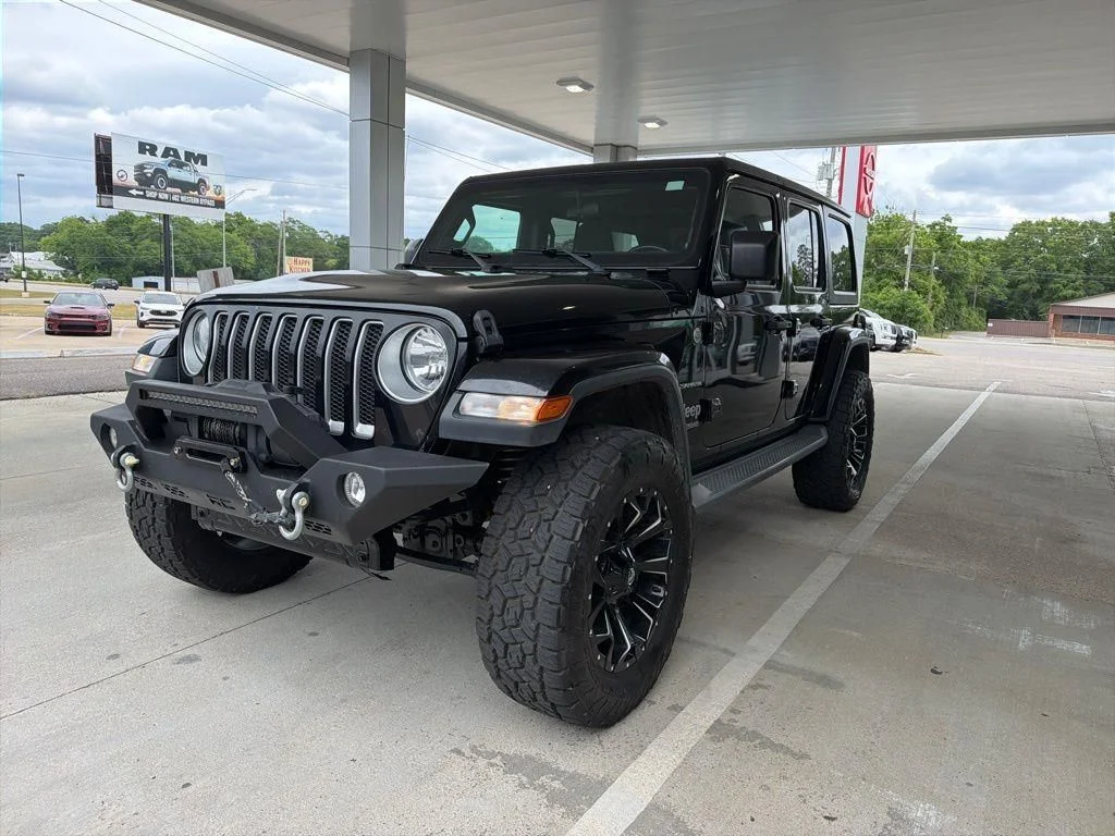 Used 2020 Black Jeep Unlimited Sahara image 1