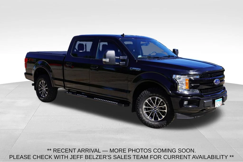 Used 2019 Black Metallic Ford Lariat image 1