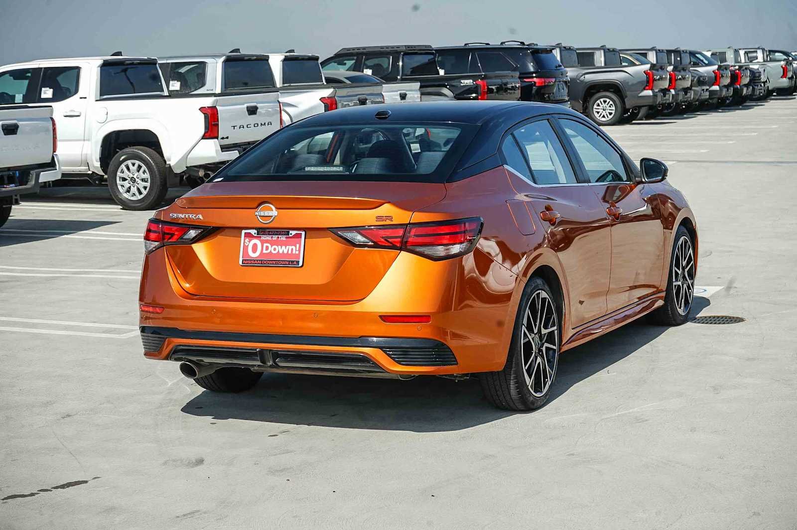 Used 2024 Monarch Orange Metallic/Super Black Nissan SR image 6