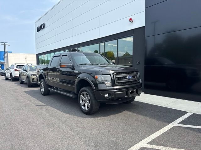 Used 2013 Black Ford FX4 image 1
