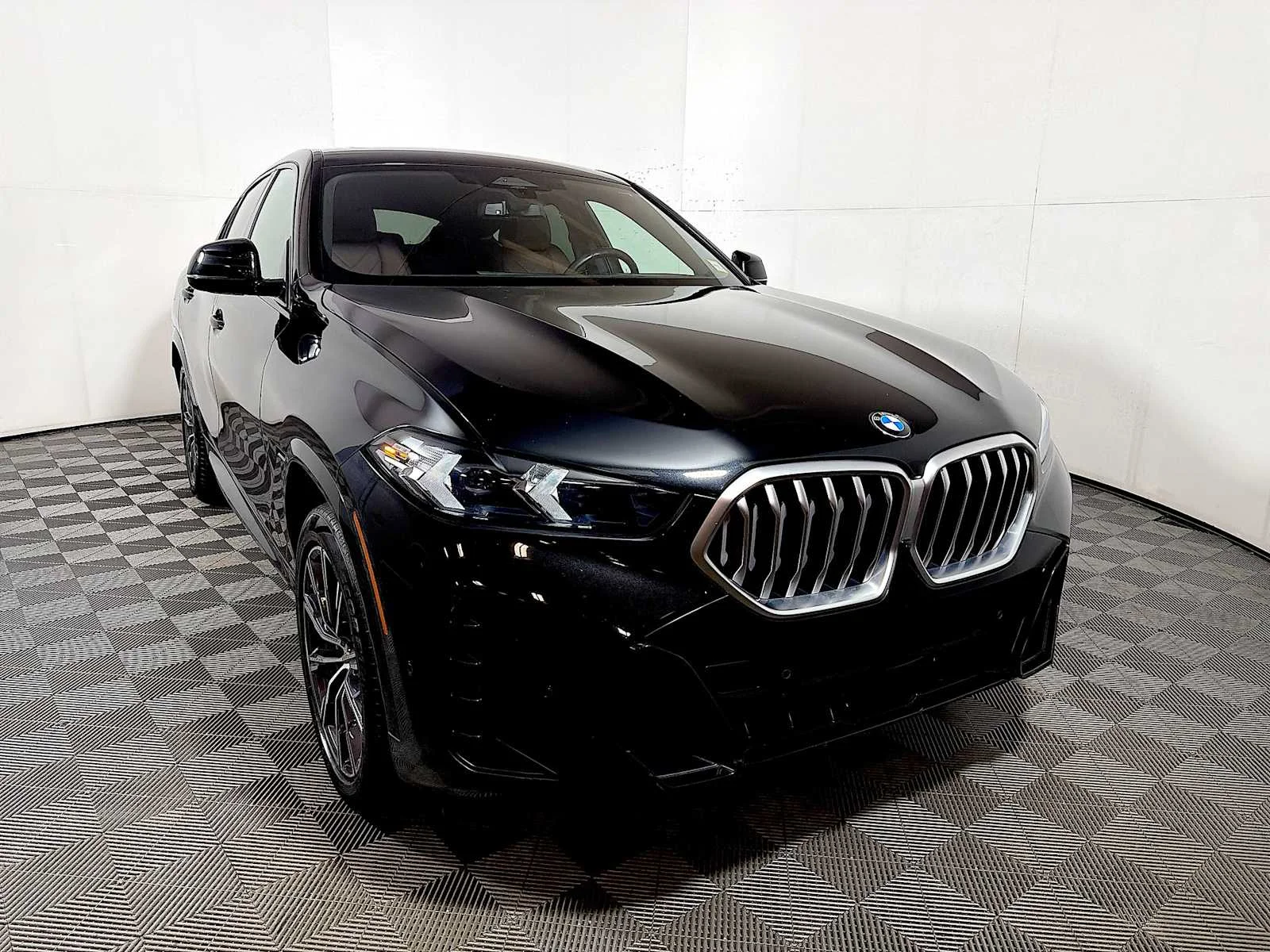Certified Used 2024 Black Sapphire Metallic BMW xDrive40i image 2
