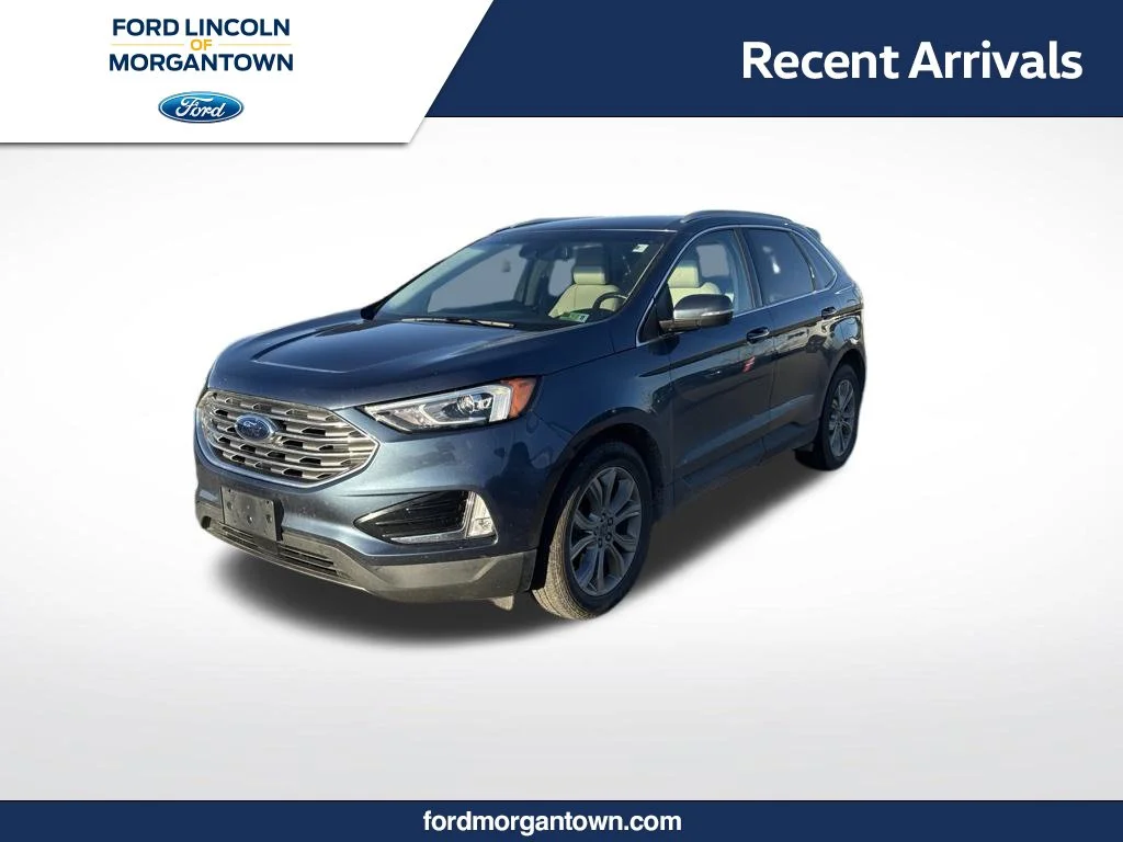 Used 2019 Blue Ford Titanium image 1