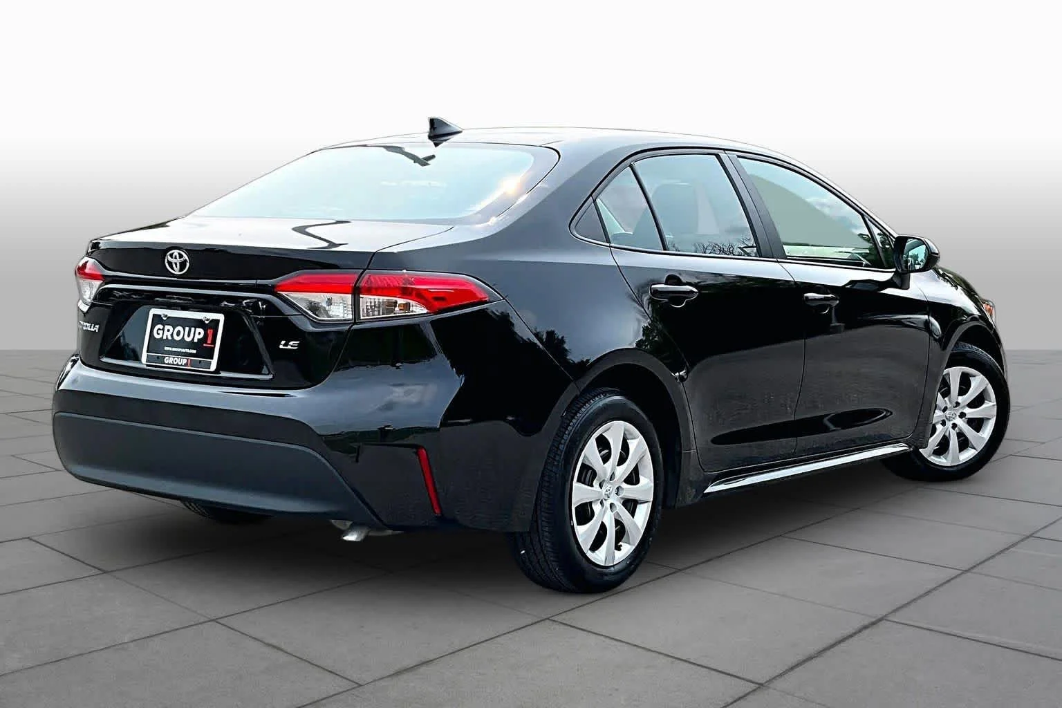 Used 2024 Midnight Black Metallic Toyota LE image 13
