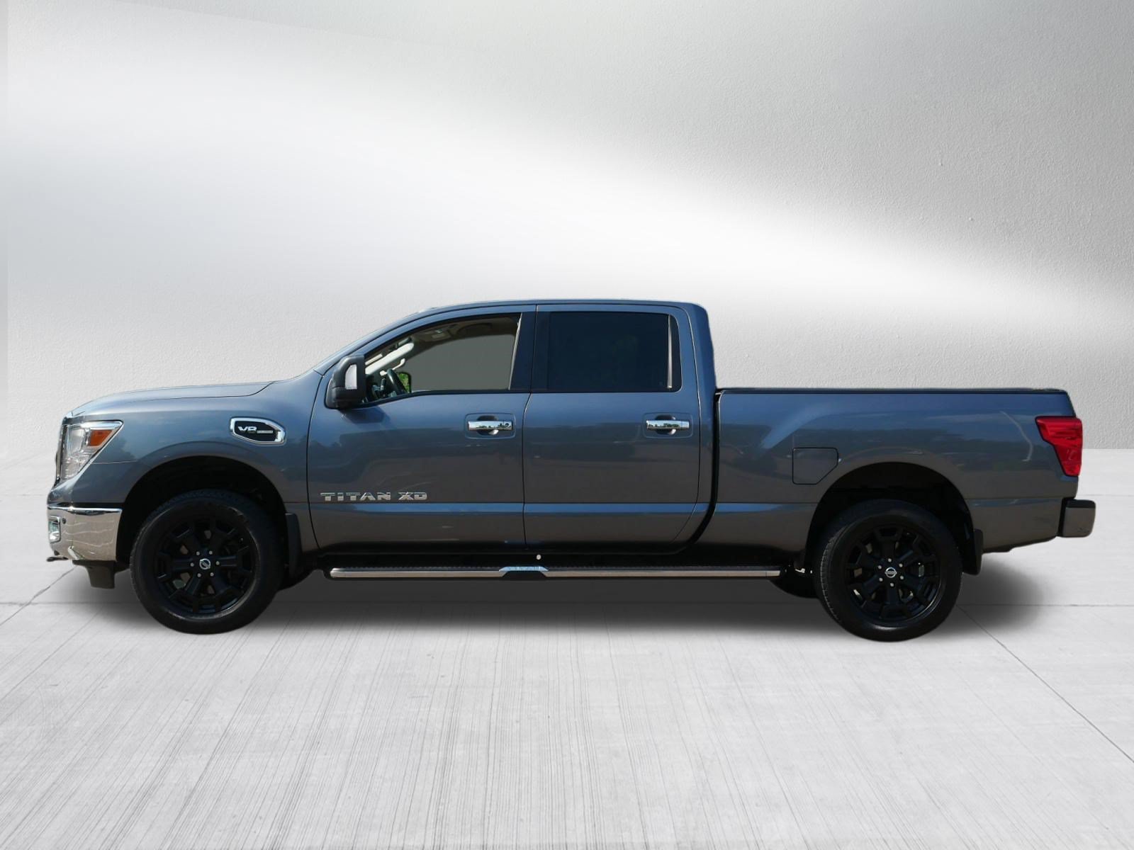 Used 2017 Gun Metallic Nissan SV image 4
