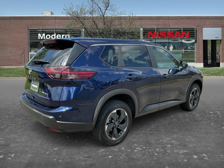 Used 2024 Deep Ocean Blue Pearl Nissan SV image 4