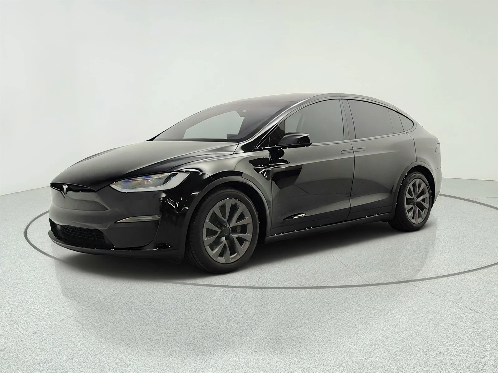Used 2024 Solid Black Tesla AWD image 1