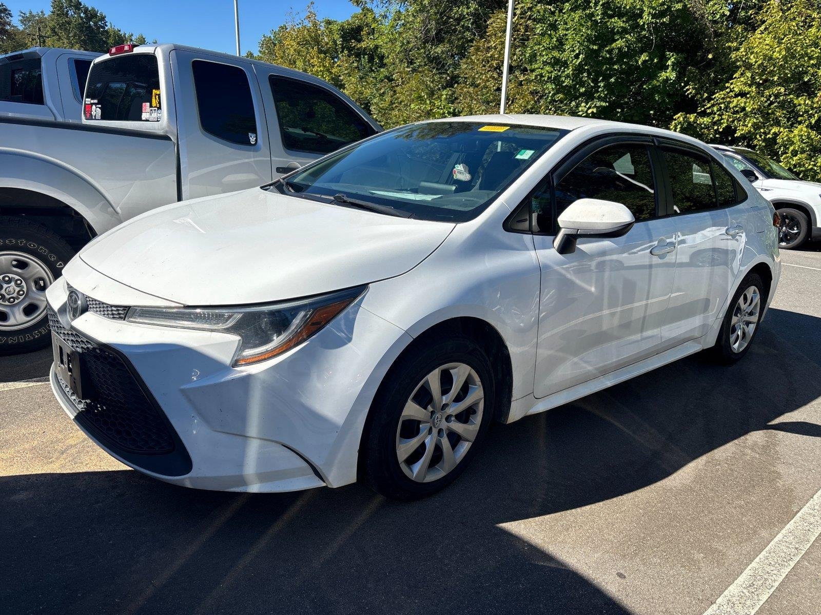 Used 2022 Super White Toyota LE image 2