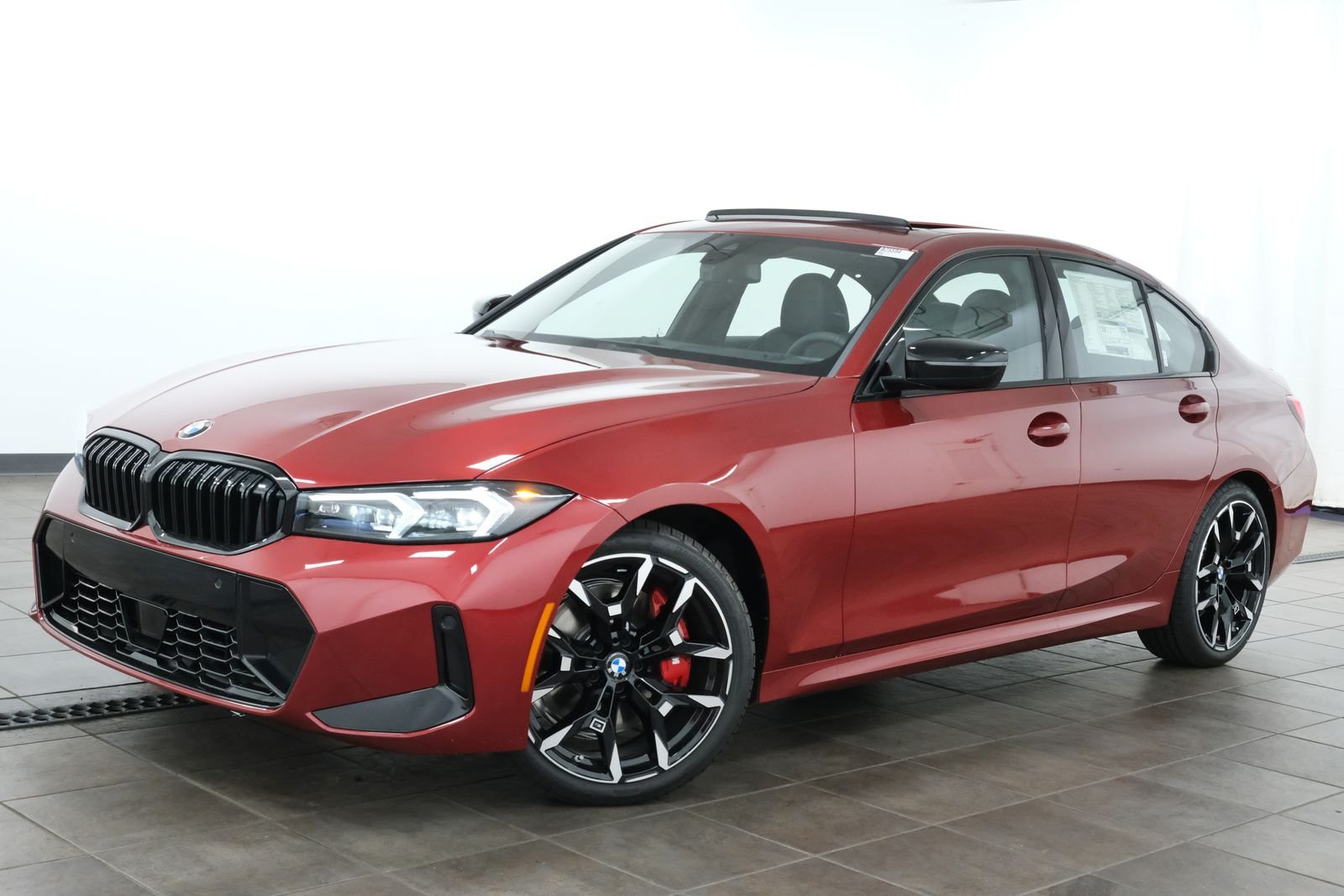 New 2026 Vegas Red Metallic BMW 330i xDrive image 1