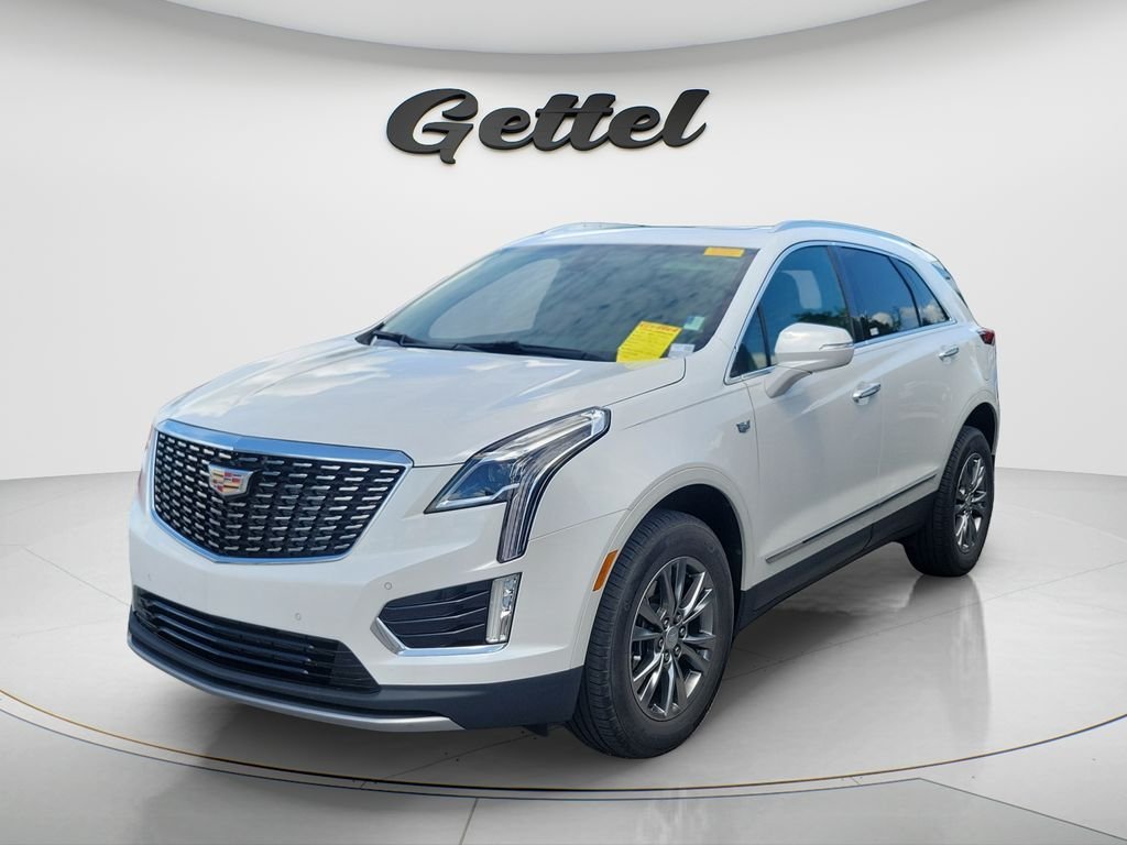 Used 2021 White Cadillac Premium Luxury image 1