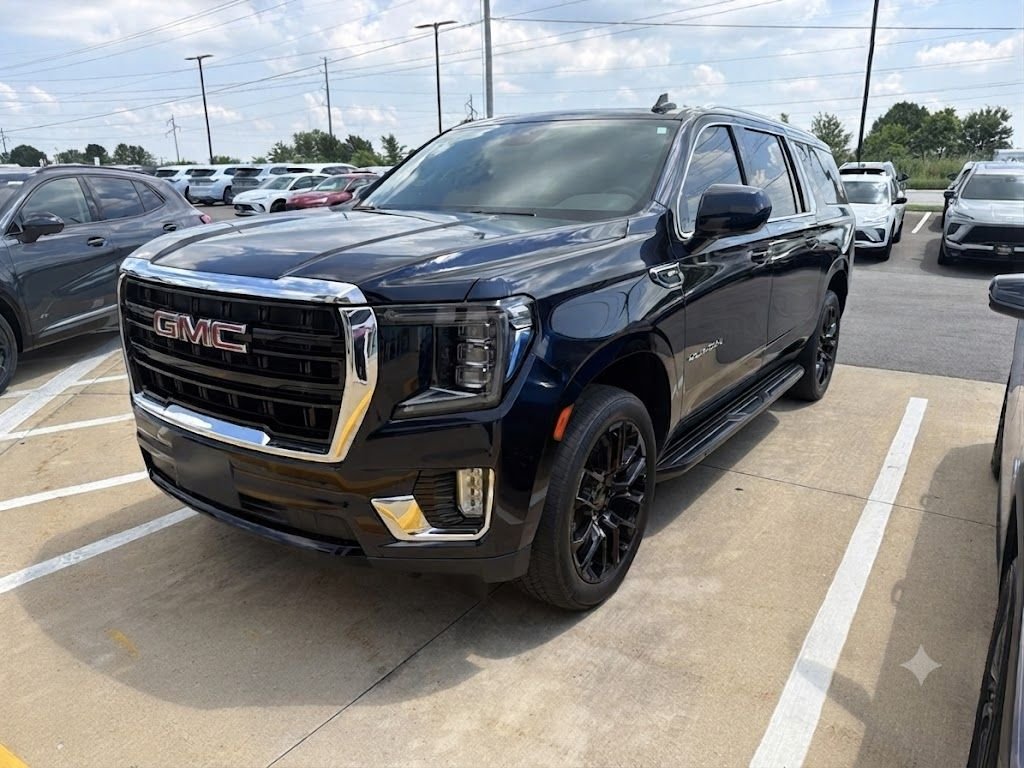 Used 2024 Midnight Blue Metallic GMC SLE image 1