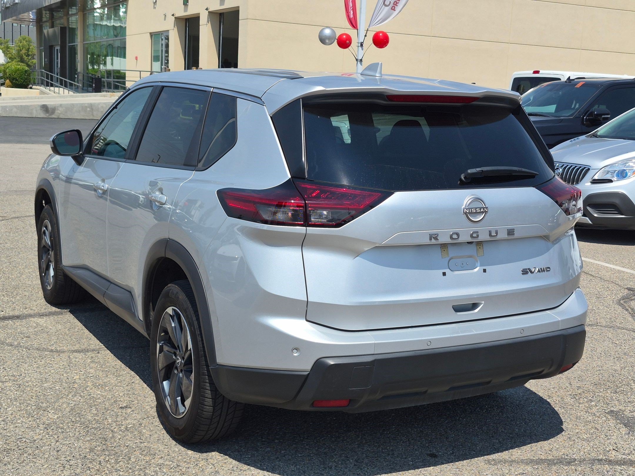 Used 2024 Brilliant Silver Metallic Nissan SV image 5