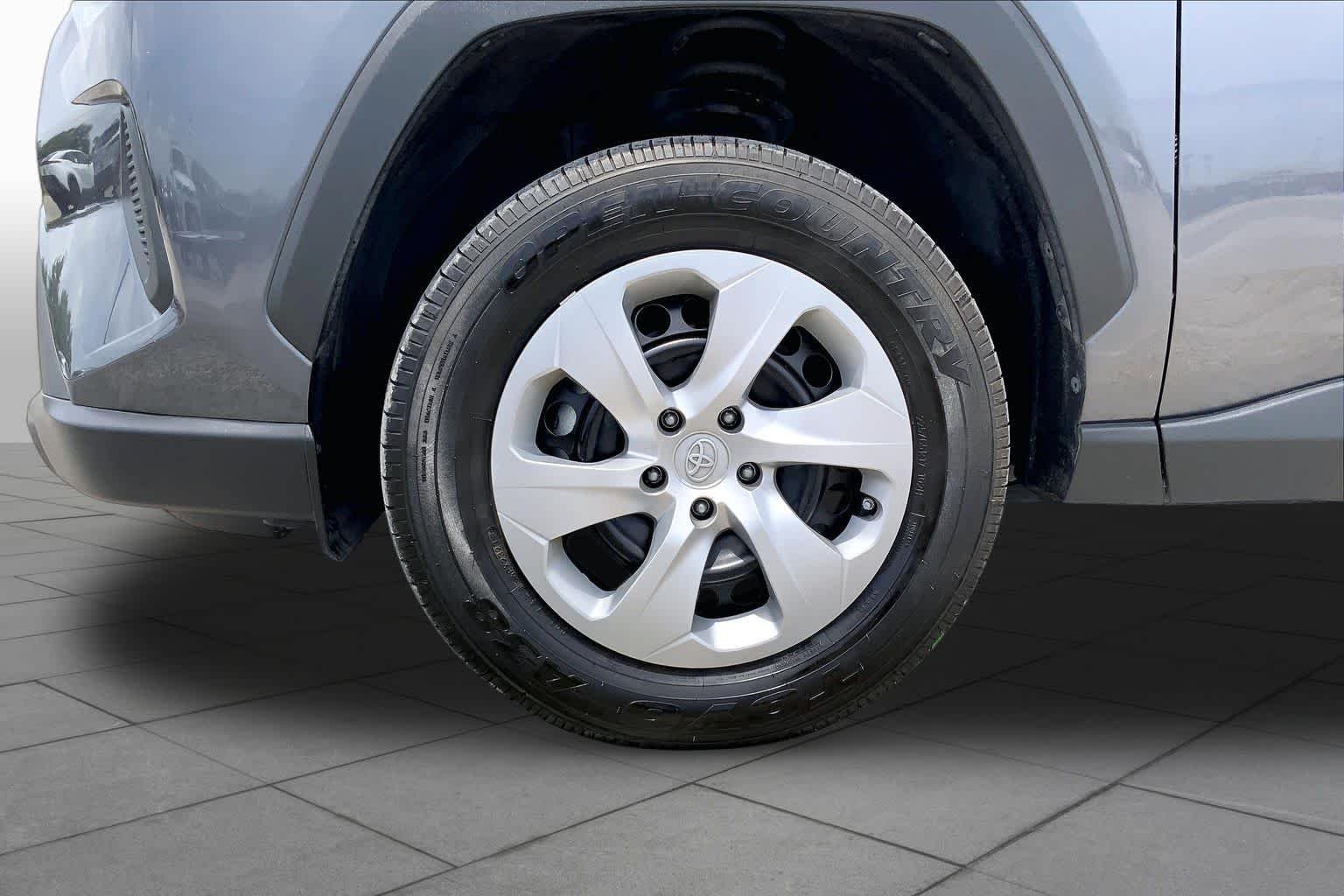 Used 2023 Magnetic Gray Metallic Toyota LE image 11