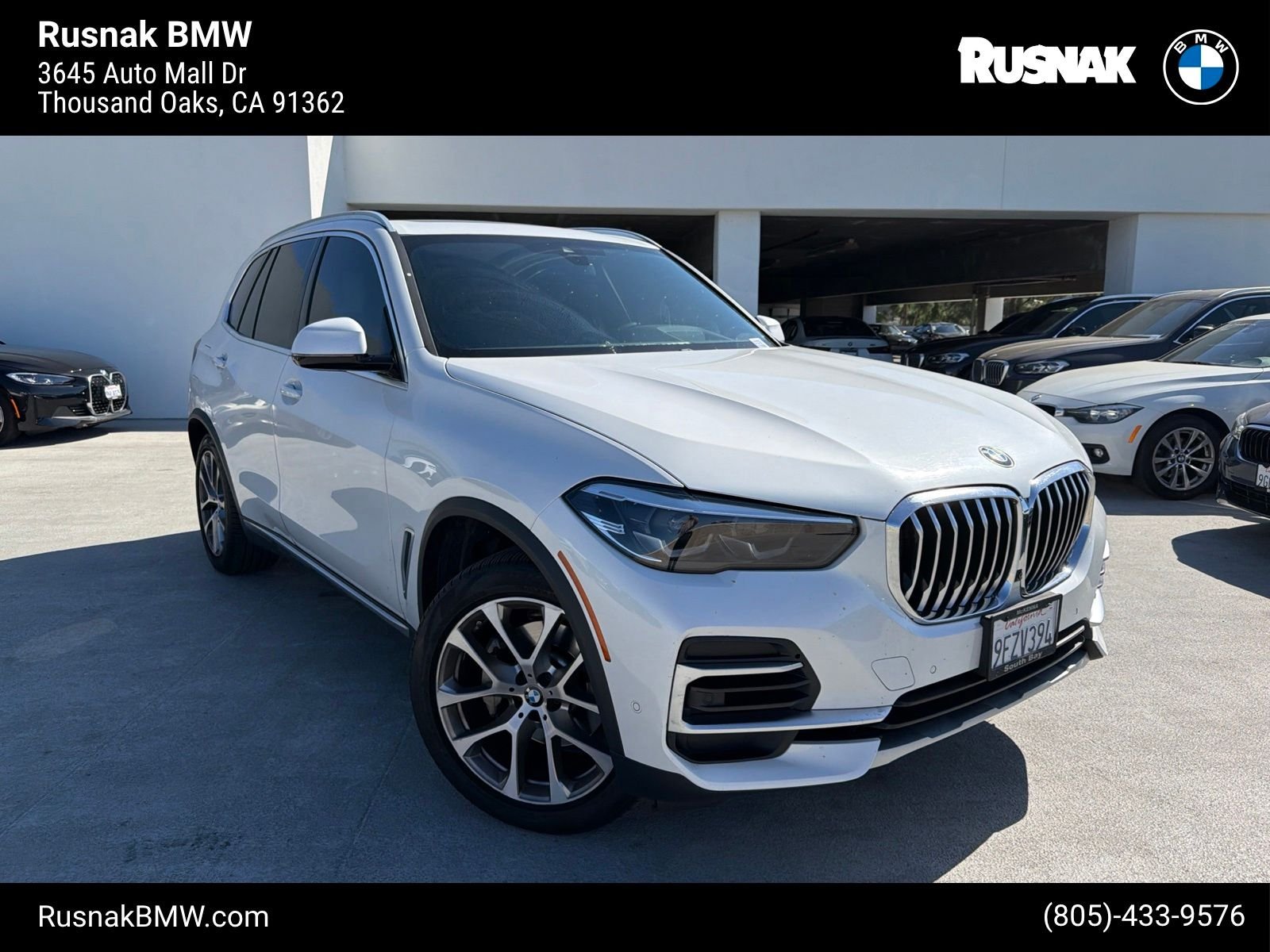 Certified Used 2023 Mineral White Metallic BMW xDrive40i image 1