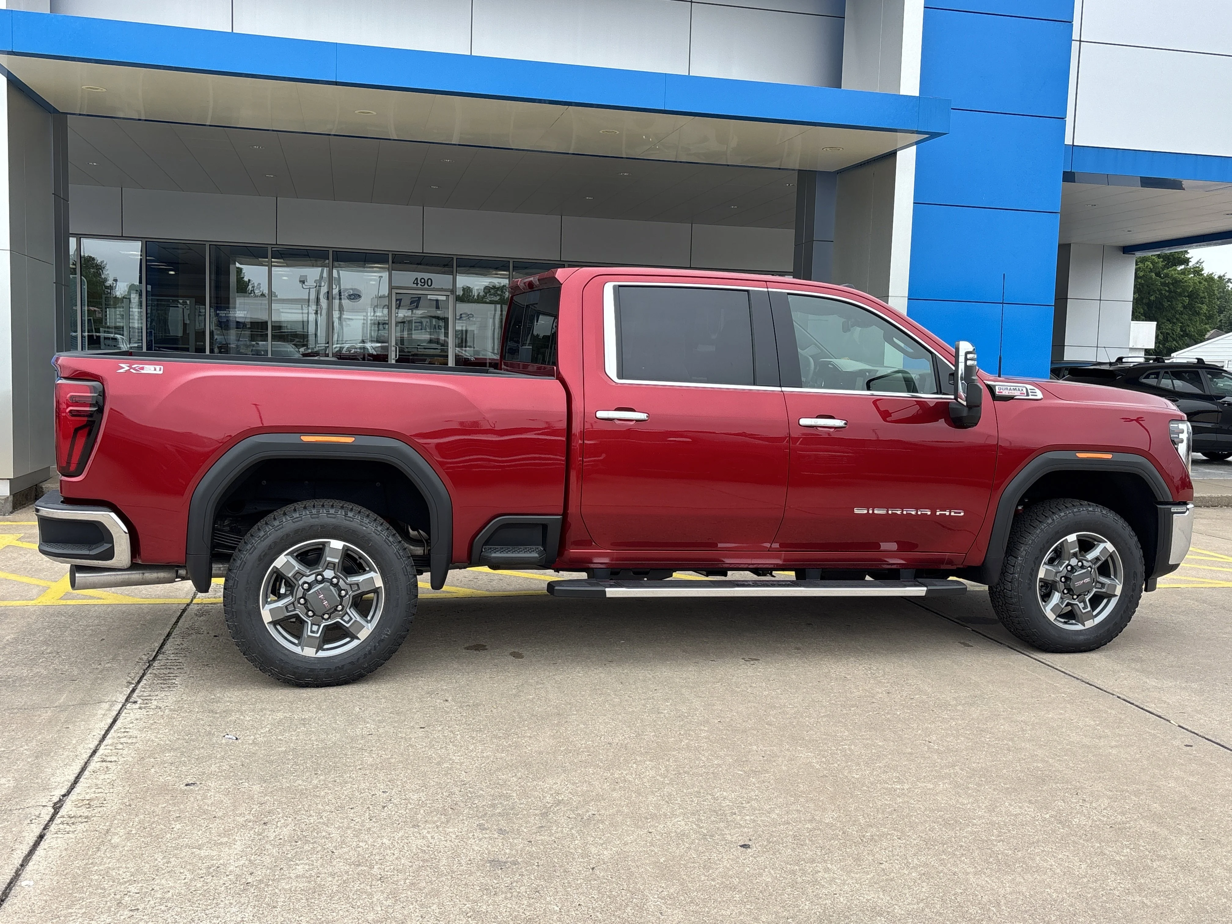 New 2026 Volcanic Red Tintcoat GMC SLT image 2