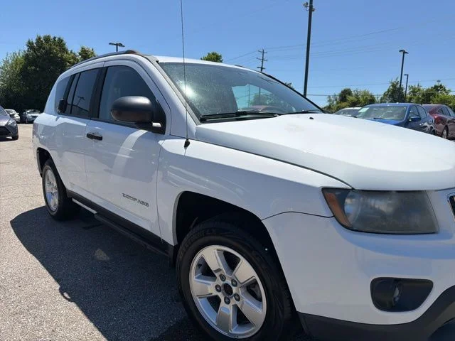 Used 2014 White Jeep Sport image 1