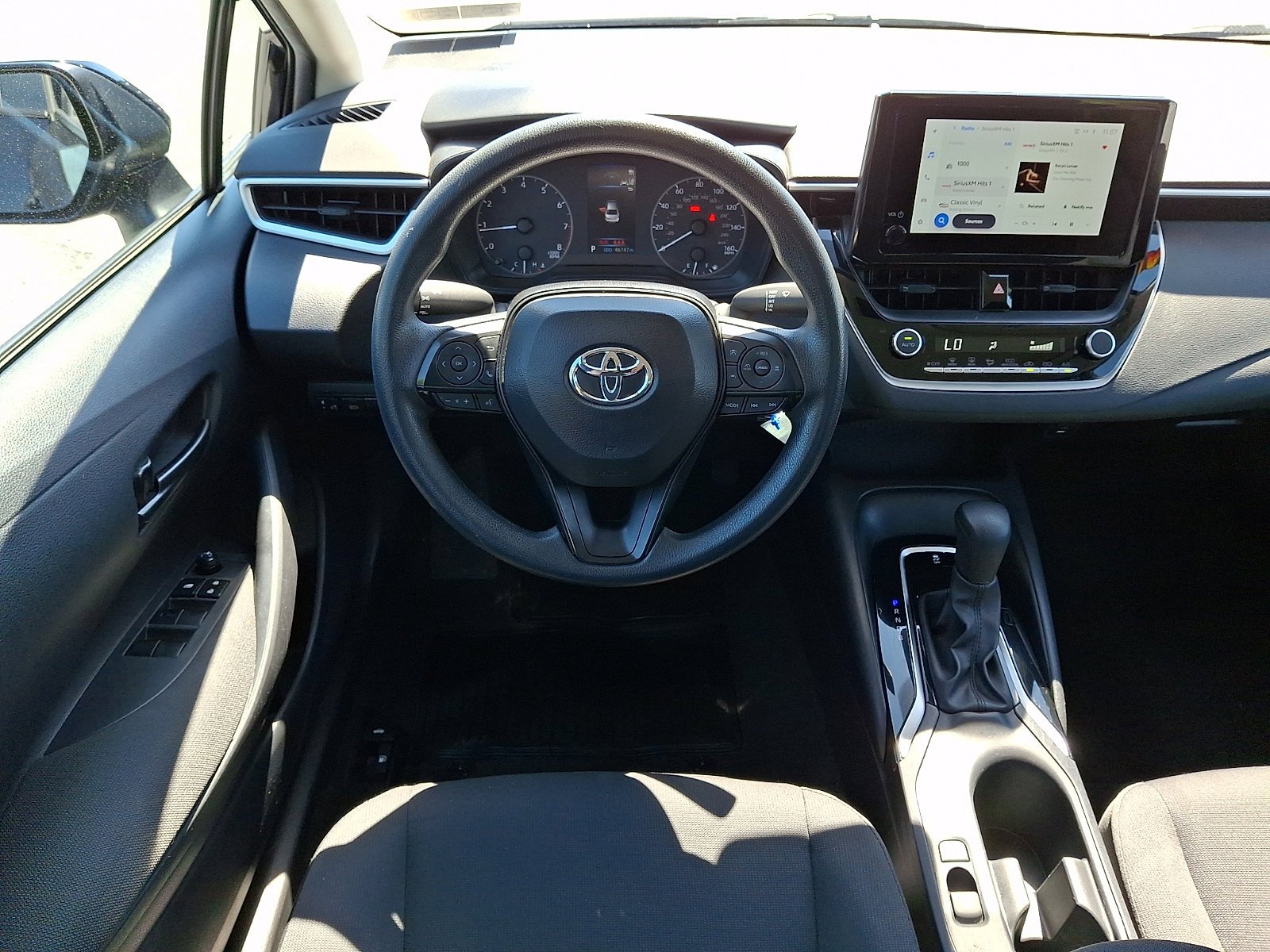 Used 2025 Midnight Black Metallic Toyota LE image 13