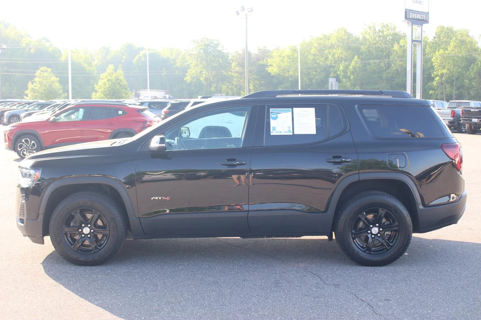 Used 2023 Ebony Twilight Metallic GMC AT4 image 4