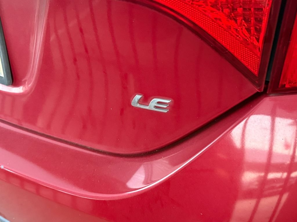 Used 2016 Barcelona Red Metallic Toyota LE Plus image 7