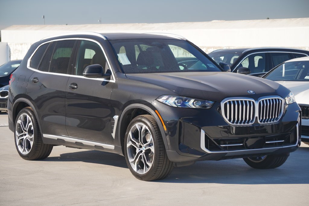 Used 2026 Black Sapphire Metallic BMW xDrive50e image 3